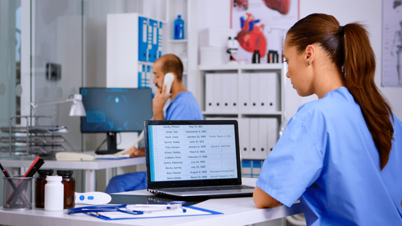 Doctor working in a laptop