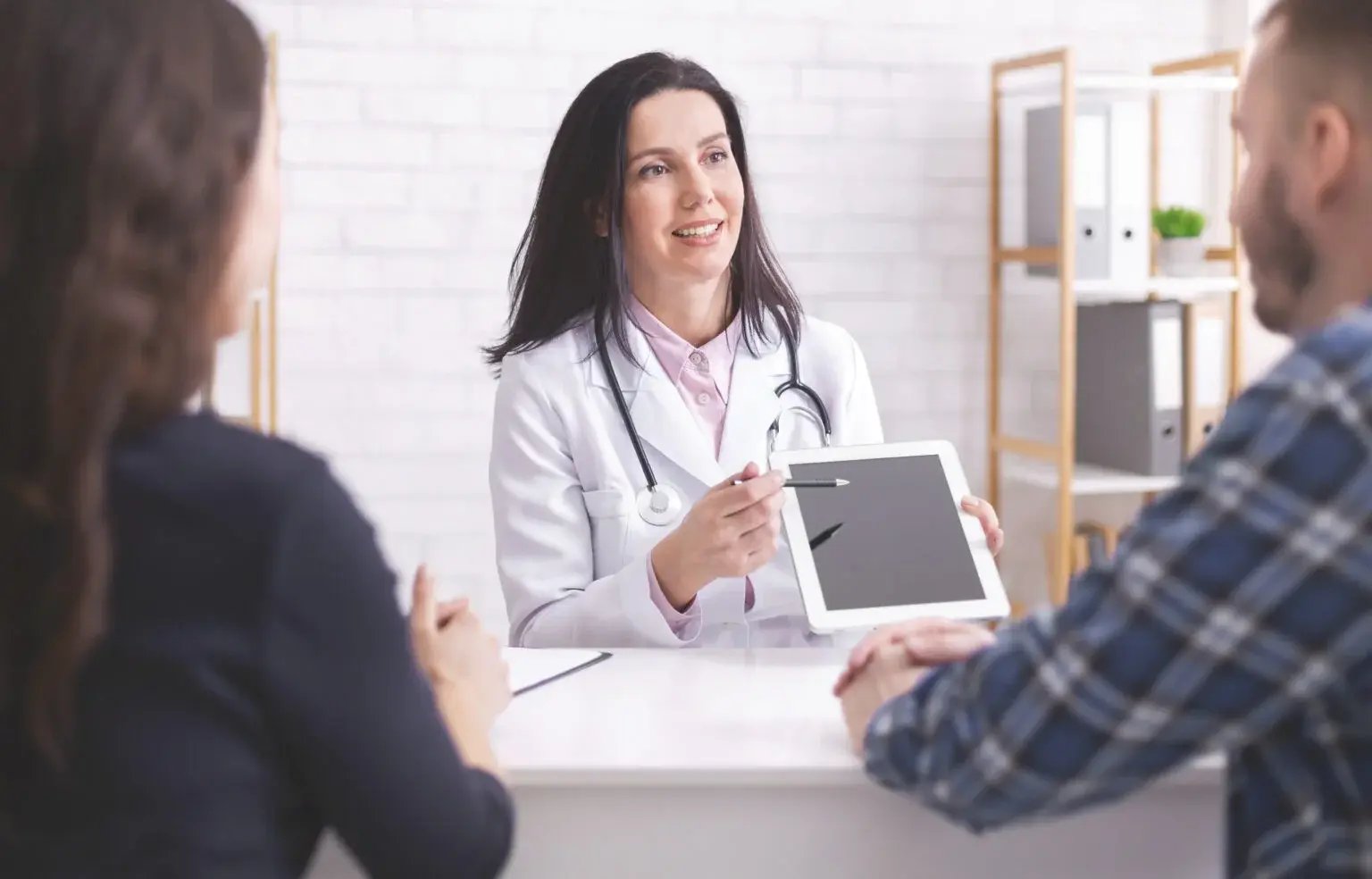 doctor-showing-test-results-on-digital-tablet-to-m-2025-03-18-17-40-24-utc-1536x984