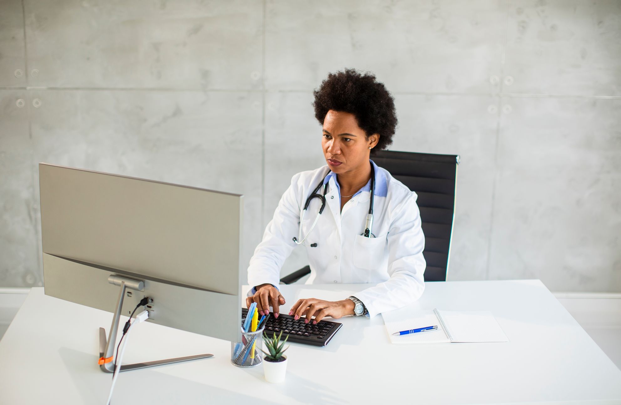 Doctor using EHR Software for Solo Physicians