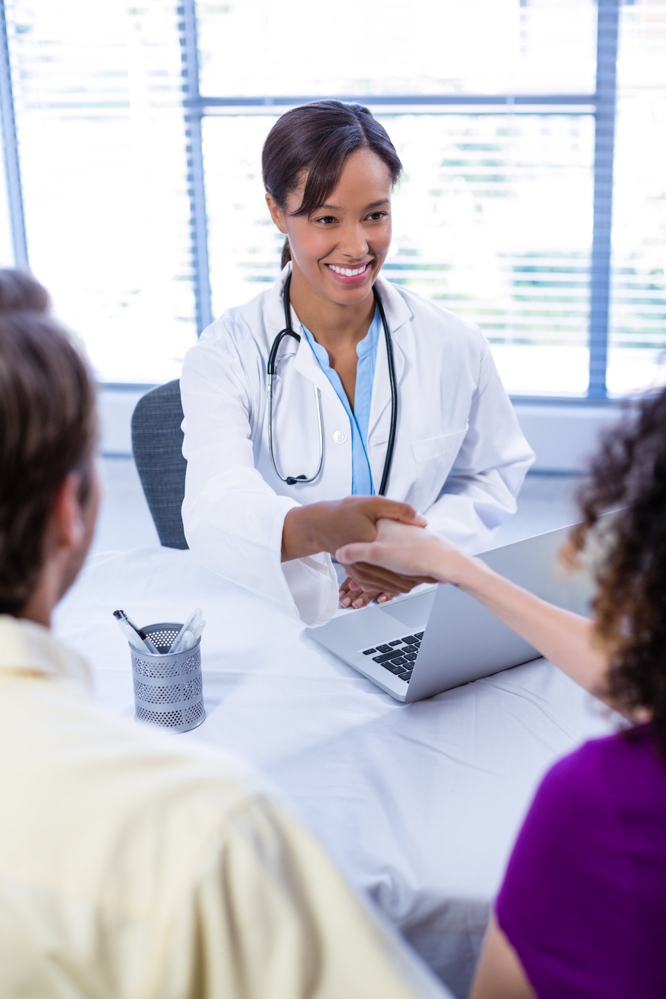 doctor-and-woman-shaking-hands-2025-04-03-06-50-08-utc (2)