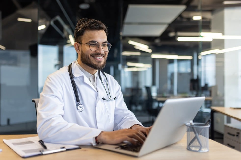 Doctor working on Cloud-Hosted EHR