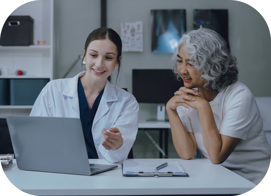 Doctor and patient reviewing patient engagement software (1)